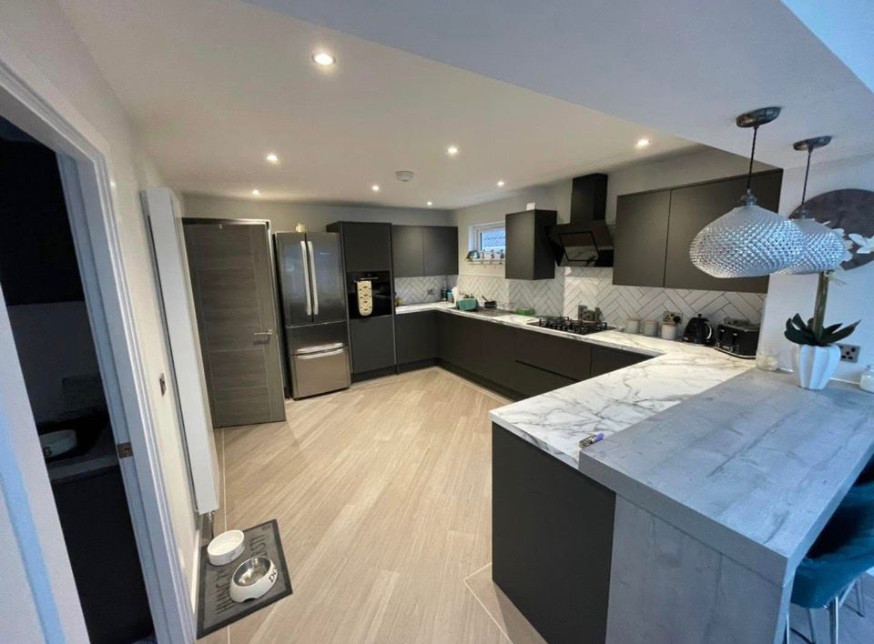 Modern Kitchen with Marble Worktops by Marshall & Co in Dundee
